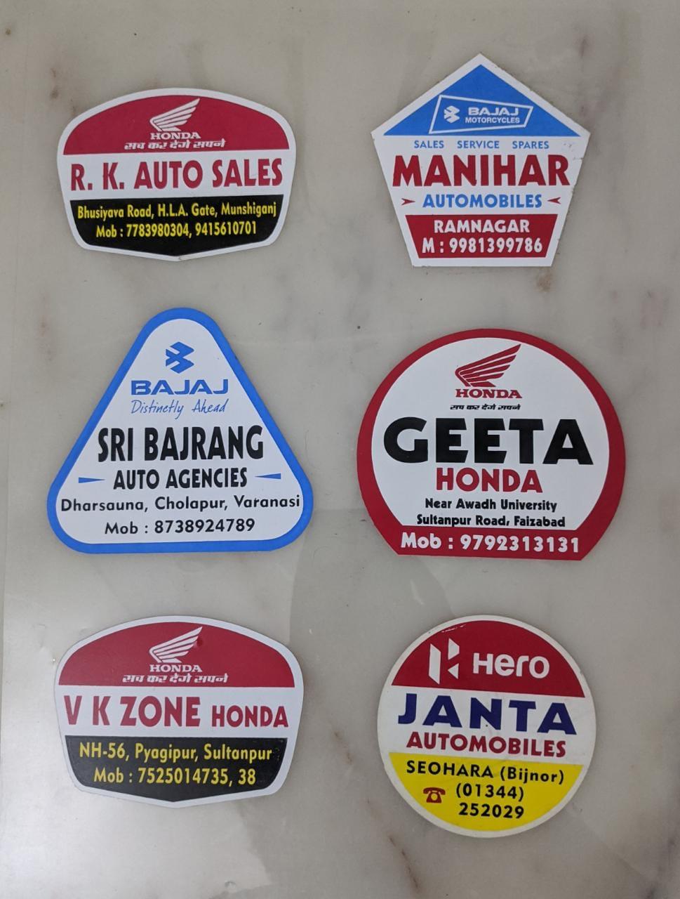 Dealer identity stickers — Honda, Bajaj, Hero collection