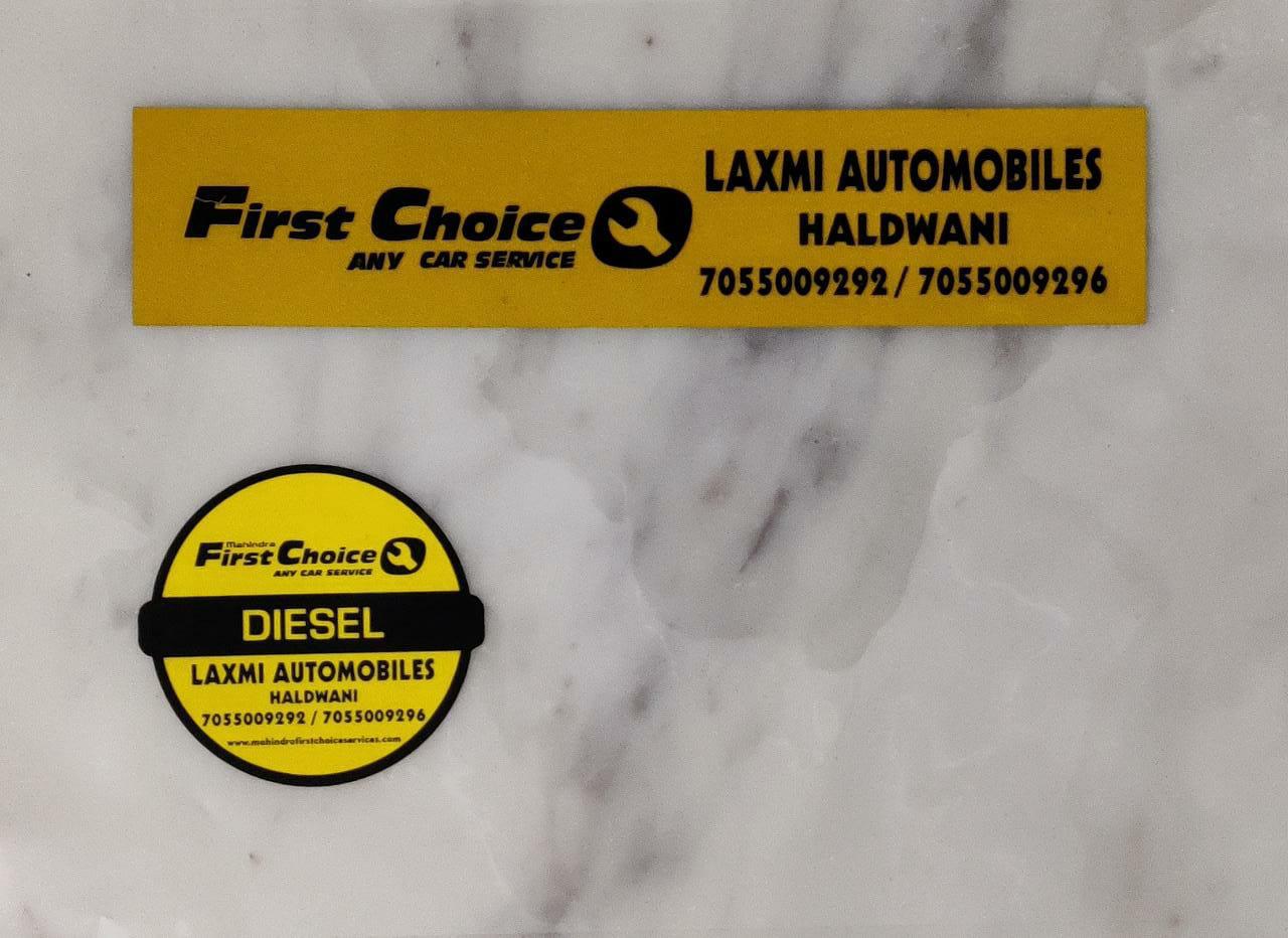 Mahindra First Choice dealer identity — Laxmi Automobiles, Haldwani