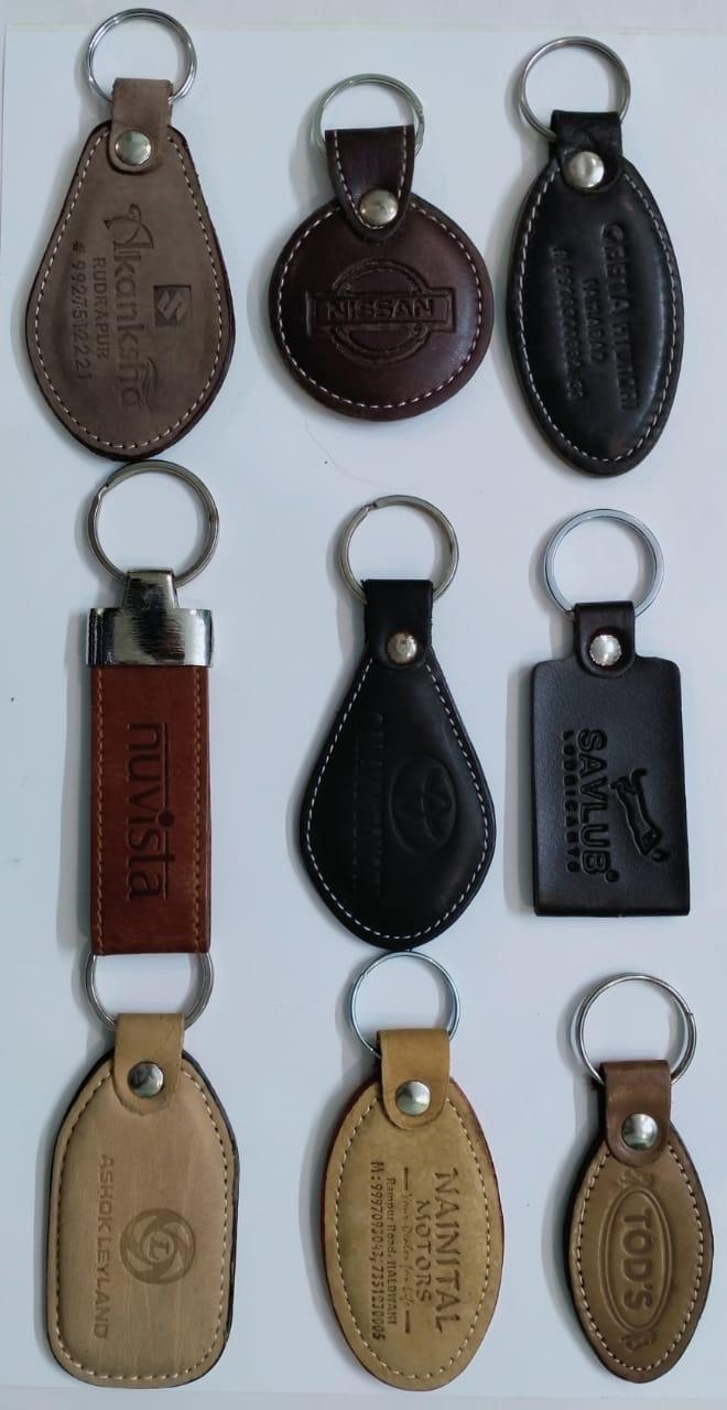 Leather keychains — Kanksha Mahindra, Nissan, Ashok Leyland, Nuvista, Toyota