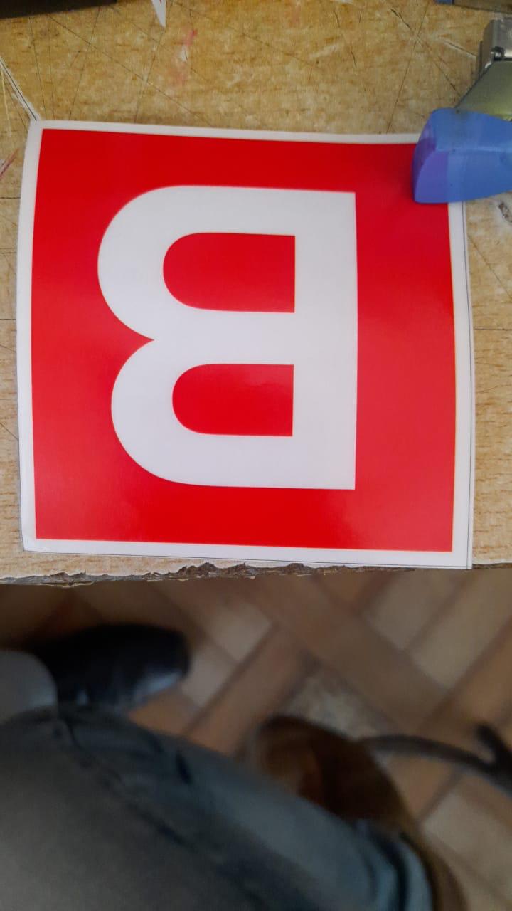 Large format Bajaj vinyl — showroom branding